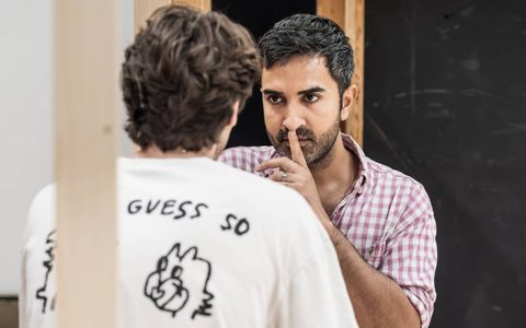 Parth Thakerar puts his finger to his lips.