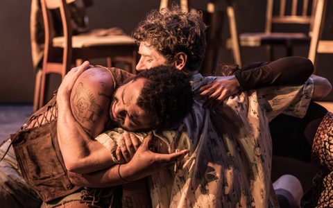 Kyle Soller embraces Yanexi Enriquez and Olivier Huband. Olivier rests his head on Kyle’s shoulder.