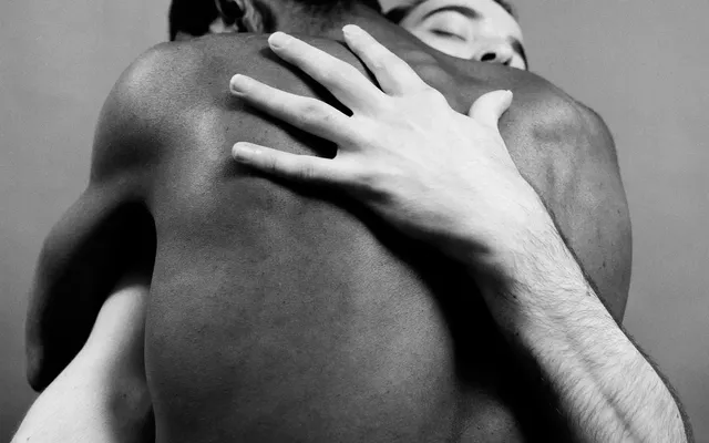 Untitled, 1988, Rotimi Fani-Kayode A black and white photo of two people embracing